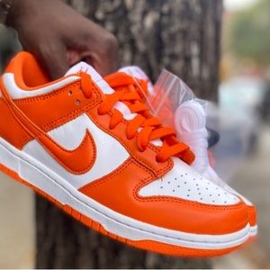 Nike orange and white dunks